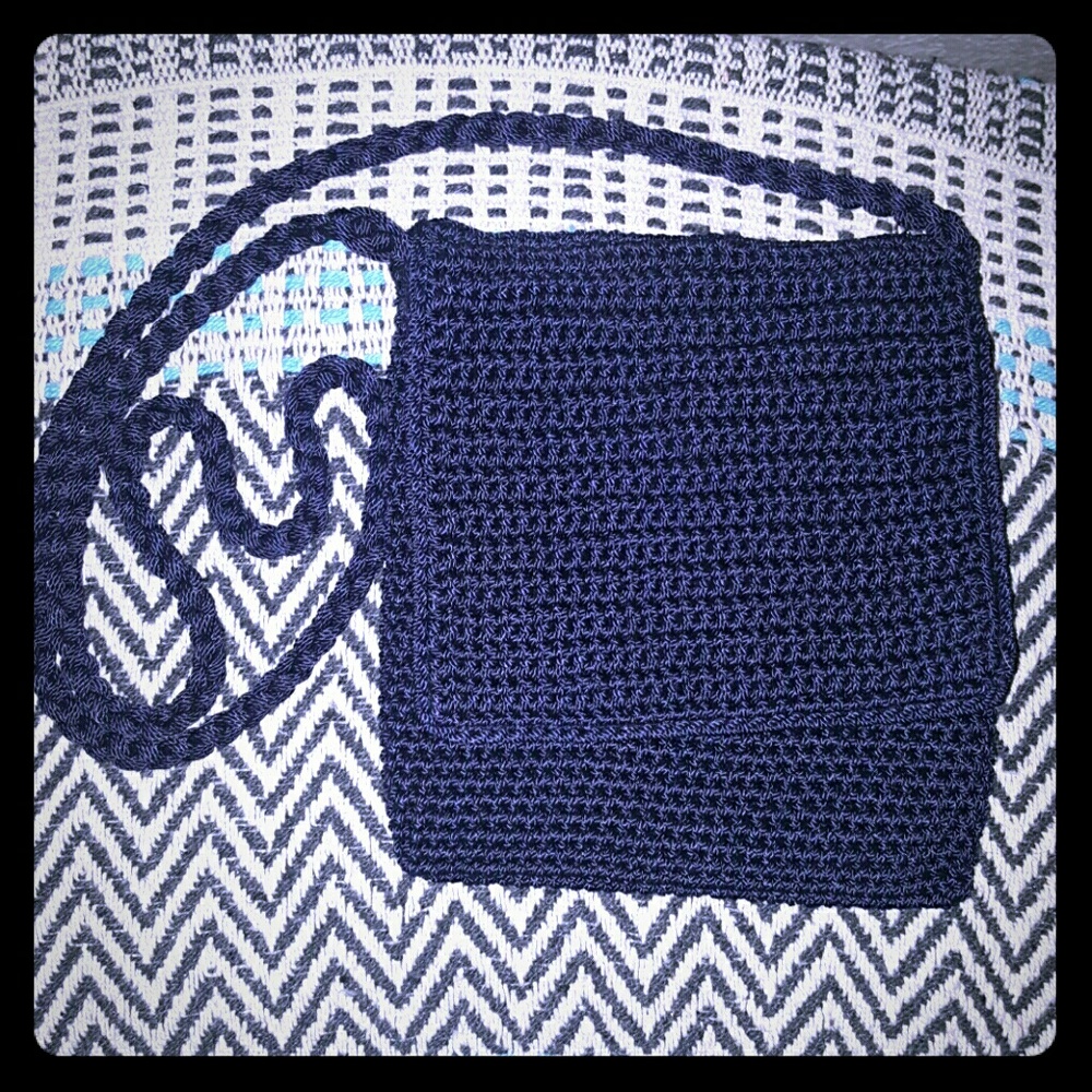 Lina cross over crocheted purse.